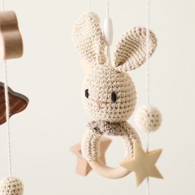 Handmade crochet bunny baby mobile with stars, soft neutral tones, perfect nursery decor, and sensory toys from Monalisa Store.