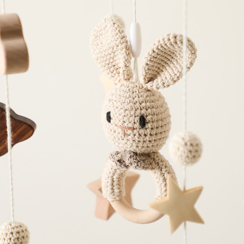 Handmade crochet bunny baby mobile with stars, soft neutral tones, perfect nursery decor, and sensory toys from Monalisa Store.
