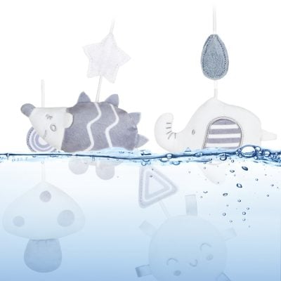 Soft plush baby toys resembling unicorns and elephants, perfect for nursery decor and sensory development.