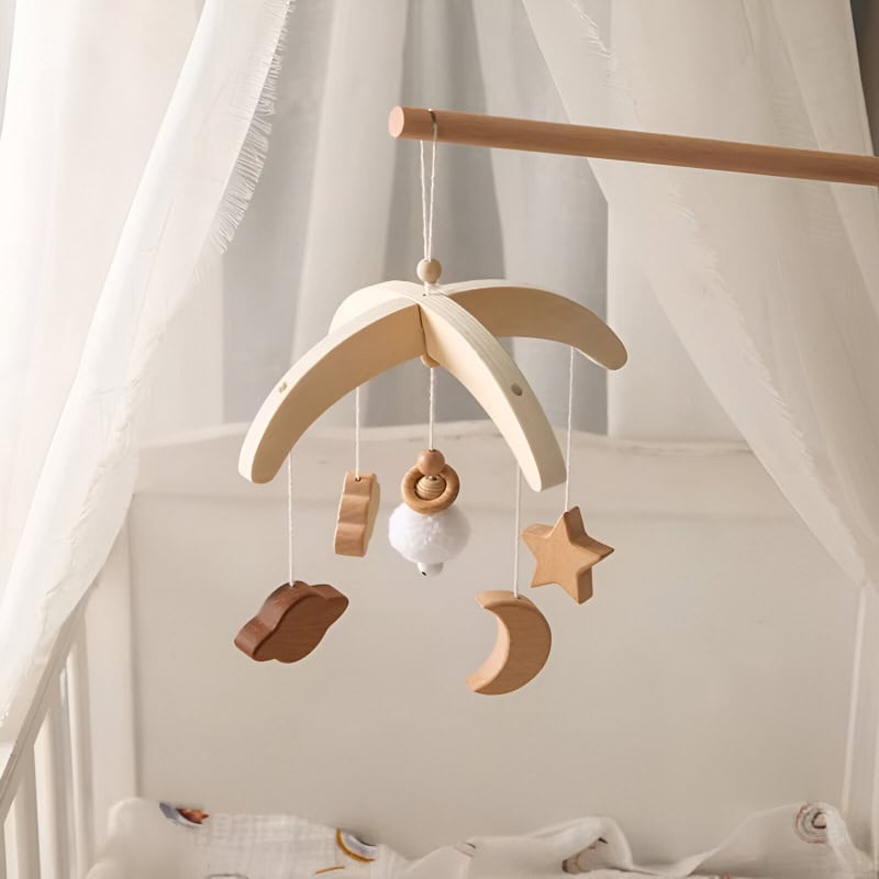 Natural wood baby crib mobile with moon, star, cloud, and geometric shapes, perfect for nursery decor and calming baby sleep. Elegant, minimalist design from Monalisa Store.