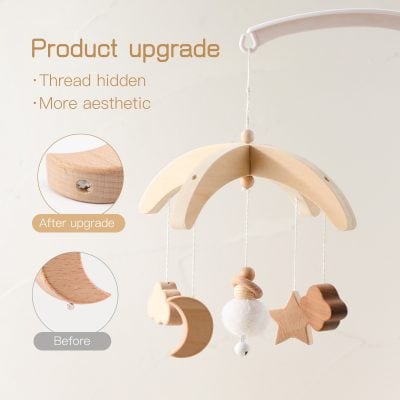 Soft wooden baby mobile with moon, star, and cloud charms for nursery decor, featuring a product upgrade for improved aesthetic and hidden thread design.