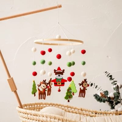 Baby mobile with reindeer, Santa, and Christmas trees, ideal for nursery decor and holiday season, featuring felt ornaments and hanging decorations for festive nursery or baby nursery room.
