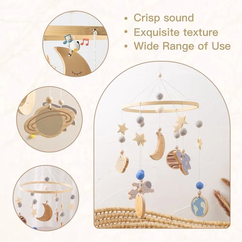 Soft baby mobile with wooden planets, stars, moon, and elephant, perfect for nursery decor and sensory development. Offers crisp sound, exquisite texture, and wide range of use for infants.