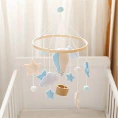 Soft plush baby mobile with stars and clouds, ideal for nursery decor and infant soothing, available at Monalisa Store for baby care and comfort.