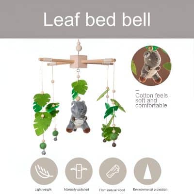 Soft plush hippopotamus baby crib mobile with leaf-shaped felt decorations, ideal for nursery decor, made from natural wood, lightweight, eco-friendly, and featuring cotton felt for comfort and durability.