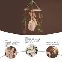 Soft plush baby-activating mobile with natural wooden toys, colorful beads, and feathers, designed to soothe and entertain infants while promoting eye development.