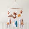 Soft baby mobile with plush clouds, stars, moons, and unicorns for nursery decoration and sensory development, featuring soothing colors and gentle designs.