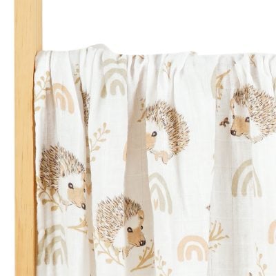 Soft white fabric curtain featuring adorable hedgehog and rainbow prints, perfect for children's rooms and baby nurseries, showcasing high-quality, child-friendly textile designs.