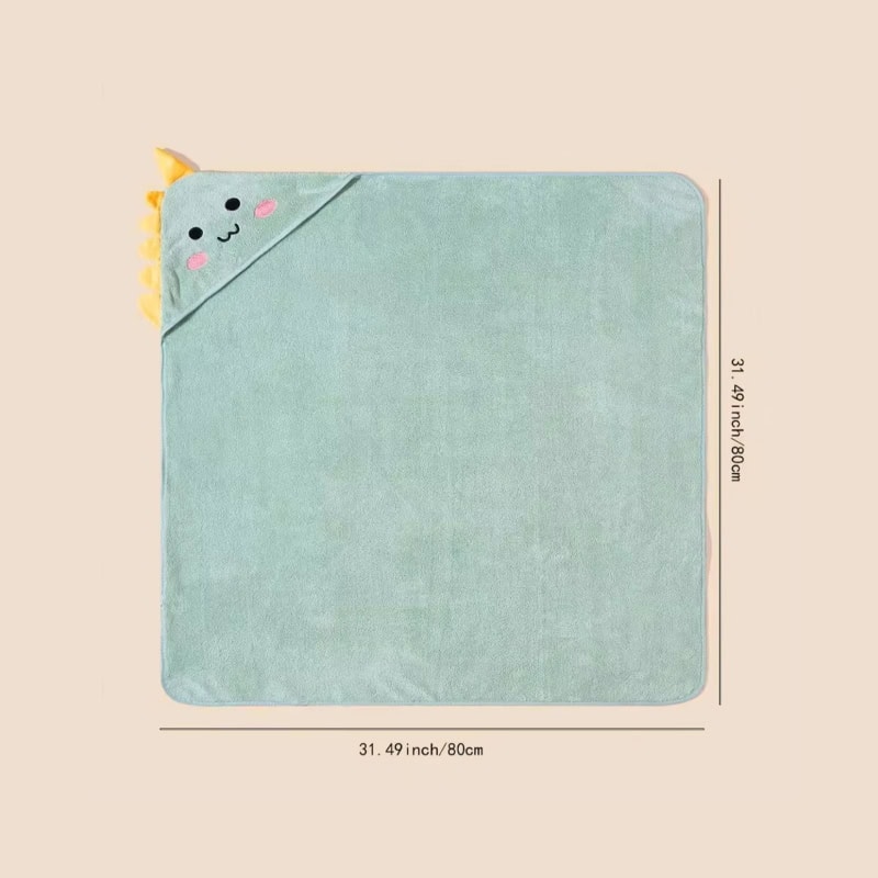 Soft pastel baby blanket featuring a cute dinosaur hood, ideal for infants, with soft plush fabric perfect for newborns, offering comfort and warmth.