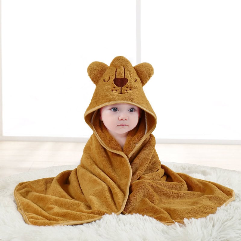 Adorable plush baby blanket with bear hood, perfect for comfort and warmth, available at Monalisa Medical Store. Ideal for baby gifts, sleepwear, and newborn essentials, combining comfort with cute design.