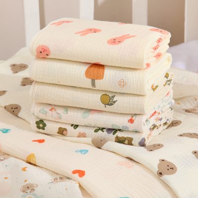 Soft baby muslin swaddles with cute animal and fruit prints for comfortable infant sleep and breastfeeding cuddle.