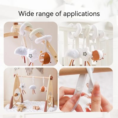 Soft plush baby toys on wooden and metal frames, ideal for infants' sensory play and development. Suitable for cribs, play mats, or nursery decor, promoting motor skills and early exploration.