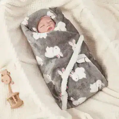 Soft baby swaddle blanket with bunny rabbit print, ideal for cozy newborn sleep and skin protection. Perfect for babies who need gentle, warm wraps for comfort and security.