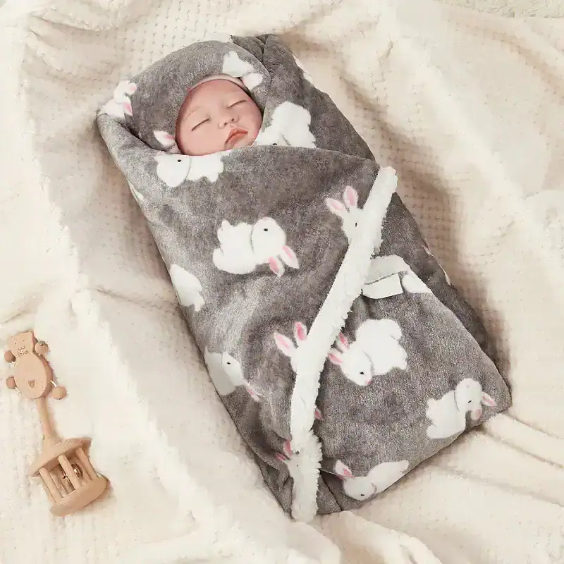 Soft baby swaddle blanket with bunny rabbit print, ideal for cozy newborn sleep and skin protection. Perfect for babies who need gentle, warm wraps for comfort and security.