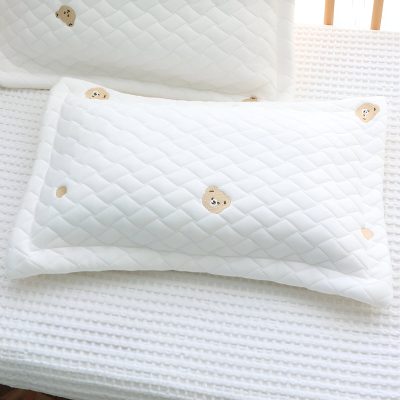 Soft white mattress with adorable bear embroidery, perfect for a cozy nursery or child's bedroom. Durable, comfortable, and designed for restful sleep for little ones.