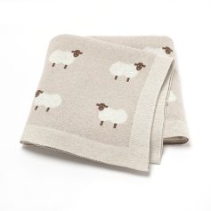Sheep-patterned beige dish towel, soft and absorbent kitchen linen for home decor and practical use.