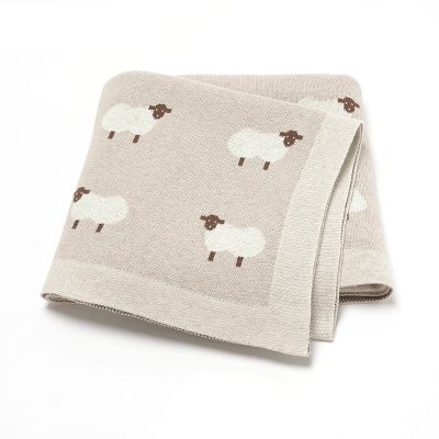 Sheep-patterned beige dish towel, soft and absorbent kitchen linen for home decor and practical use.
