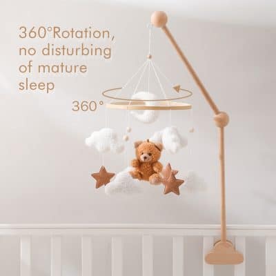 Soft baby mobile with plush teddy bear, cloud and star-shaped soft toys, designed for infant sleep comfort and nursery decor.