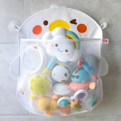Colorful baby toy organizer with smiley face design, mesh storage pocket, perfect for kids' toys and accessories in nursery or playroom.