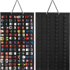Miniature car collection display on black fabric storage panel, ideal for automotive enthusiasts and collectors, featuring a variety of colorful model cars for display or organization.