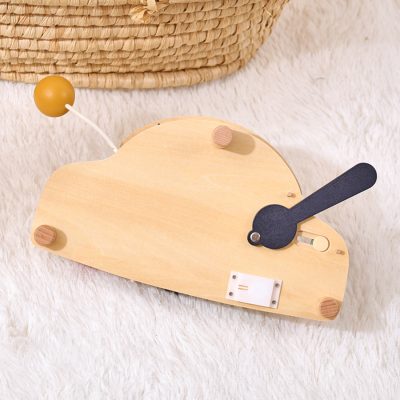 Natural wooden baby clock with minimalist design, suitable for nursery decor, easy to read, safe for baby room, and perfect for early childhood learning about time.