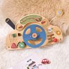 Colorful wooden car steering wheel toy for kids, with lights and sounds, ideal for early childhood development and educational play, available at Monalisa Medical.