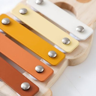 Colorful musical toy xylophone for children with metal mallets and wooden base, perfect for early childhood education and sensory play.