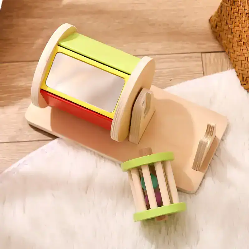 Colorful wooden toy mirror set for children, perfect for imaginative play and early development. Includes mirror, spinning cylinders, and a wooden base, ideal for toddler entertainment.