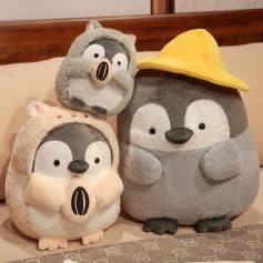 Plush animal toys from Monalisa Store, cute stuffed penguins and raccoon with accessories, perfect for kids' gifts or home decor.