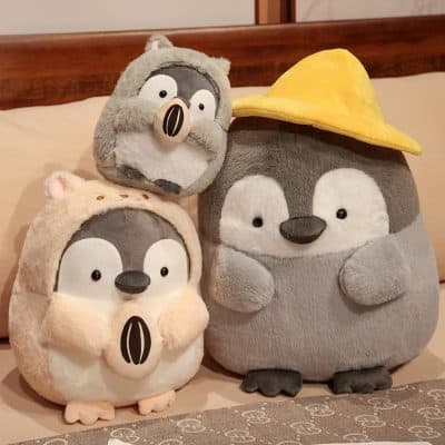 Plush animal toys from Monalisa Store, cute stuffed penguins and raccoon with accessories, perfect for kids' gifts or home decor.