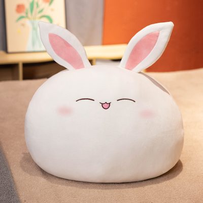 Soft plush bunny-shaped pillow with cute embroidered face, perfect for kids and adults, available at Monalisa Medical Store, ideal for home decor and gifts.