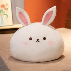Fluffy bunny-shaped cushion, adorable plush toy for kids and adults, perfect for home decor and relaxation.