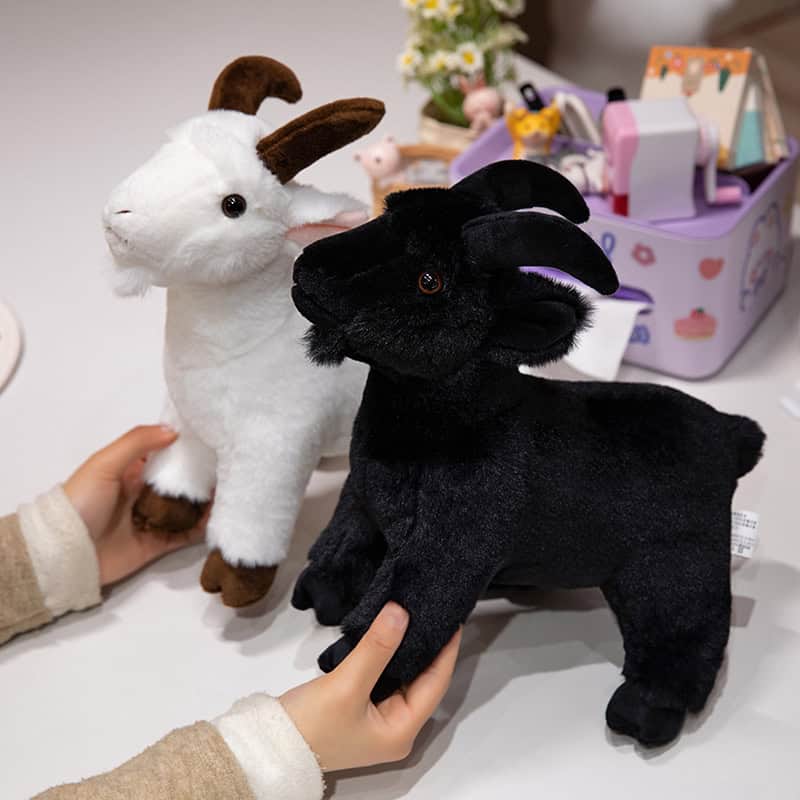 Fluffy plush rabbit toys in white and black colors with soft textures, perfect for children and collectors at Monalisa Medical Store.