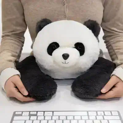 Soft panda plush toy used as a headrest at Monalisa Medical Store, perfect for comfort and relaxation.