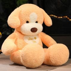 Cute plush dog toy with a soft, cuddly texture, ideal for children and collectors.