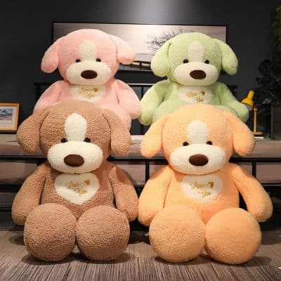 Pink and green plush teddy bears with