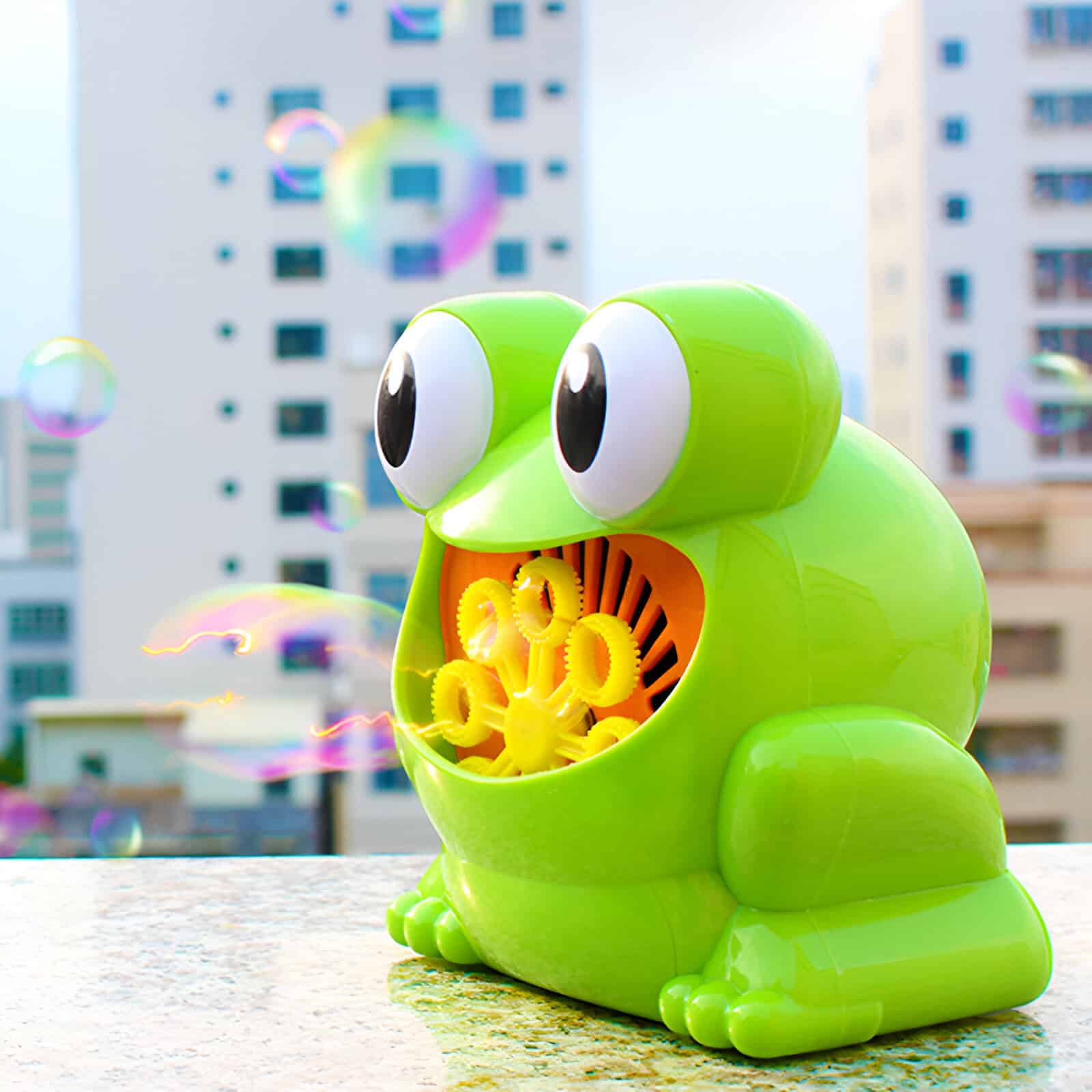 Colorful frog-shaped bubble machine for kids, perfect for outdoor play and entertainment, available at Monalisa Store for fun and novelty gifts.