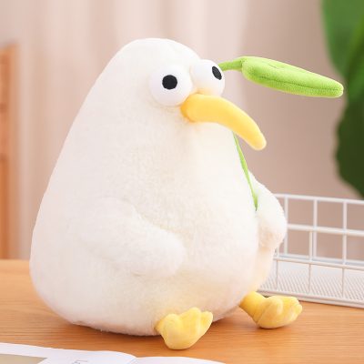 Soft plush bird toy with a yellow beak and green leaf detail, ideal for decorative or children's items at Monalisa Store.