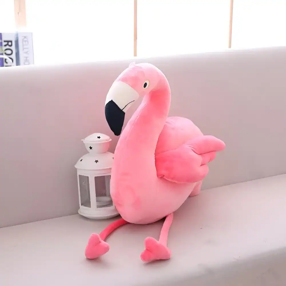Soft pink plush flamingo toy with long legs and a black beak, perfect for home or nursery decor, available at Monalisa Medical Store.