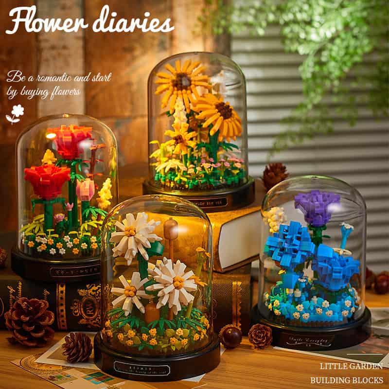 Lego flower display under glass domes for home decor and gift ideas.