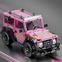 Lego-style pink toy car built from building blocks, detailed with stickers and realistic features, ideal for children and educational play, displayed on a black surface against a gray background.