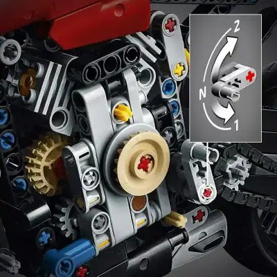 Detailed close-up of a LEGO engine model with gears, axles, and technical elements. Perfect for construction, STEM education, and toy enthusiast visuals emphasizing creativity and engineering.