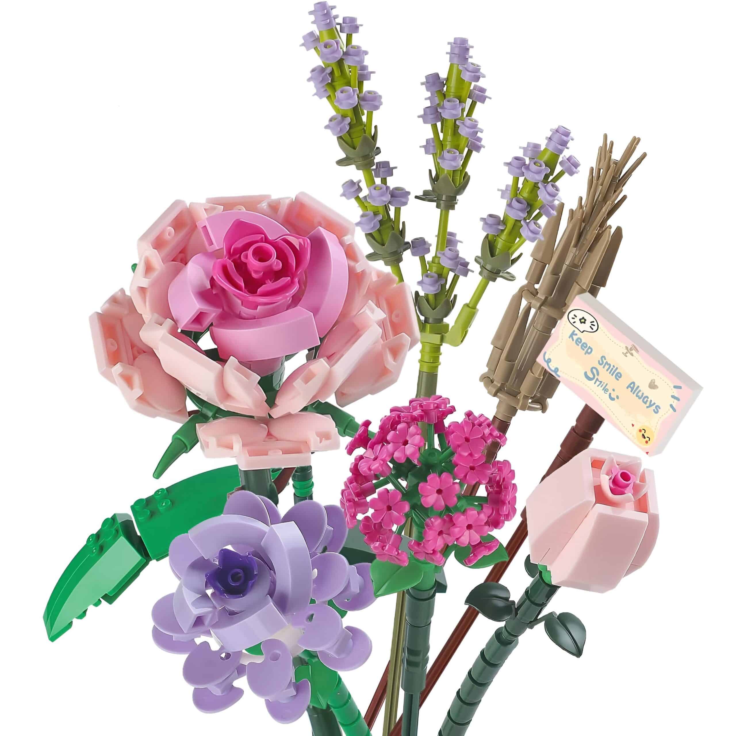 Vivid LEGO flower bouquet set featuring pink, purple, and lavender blossoms with green stems and a motivational message sign, perfect for decorative or gift purposes.