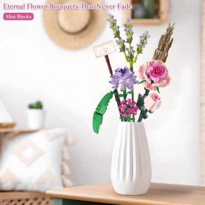 Lego flower bouquet in a white vase with pink, purple, and green LEGO flowers, perfect as a decorative and lasting gift or home décor piece, inspired by real floral arrangements.