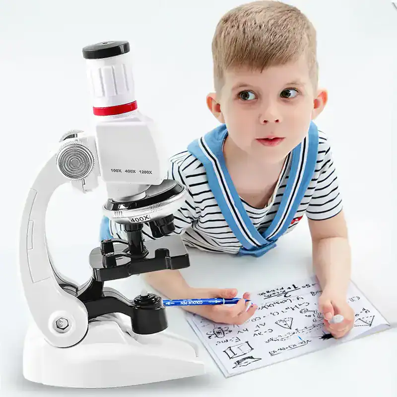 Microscope and schoolboy studying science, educational tools for children, STEM learning, science kit for kids, Monalisa Store opt, educational science equipment, kids learning science, microscopy for children, science exploration for kids, child educational microscope.