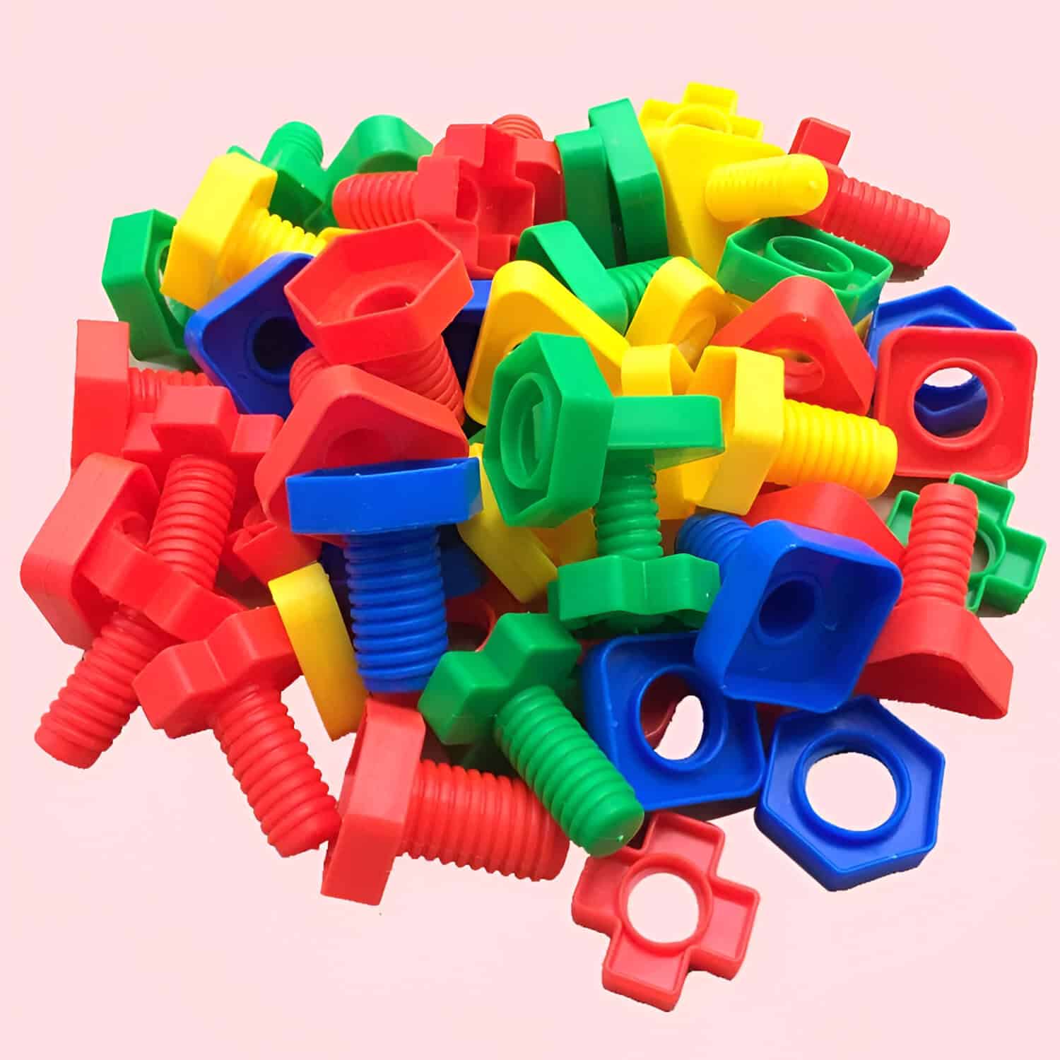 Neon-colored plastic wall anchors and screws for home improvement and drywall installation. Bright and durable wall mounting hardware in red, blue, green, and yellow. Perfect for DIY projects.