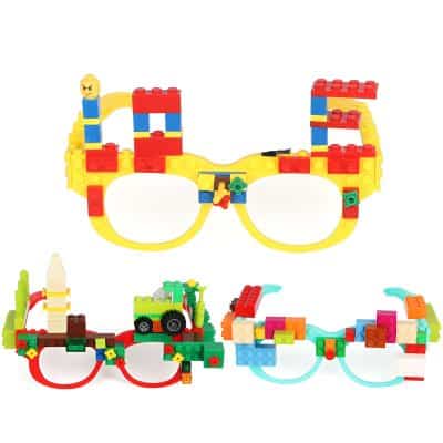Colorful children's building blocks toy glasses inspired by LEGO, with vibrant red, yellow, green, and blue pieces, designed for playful eye gear or imaginative pretend play.