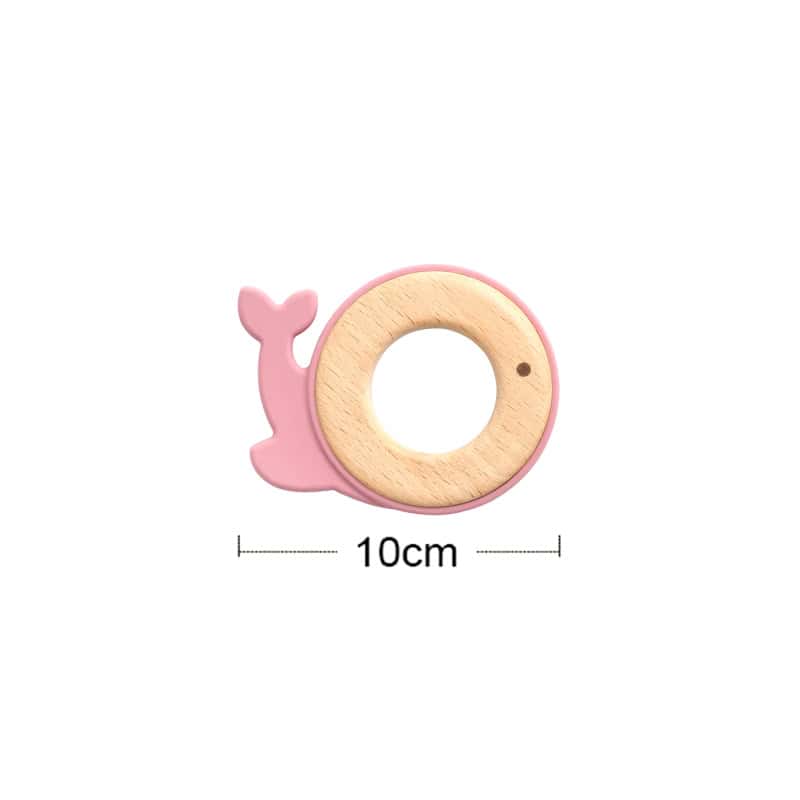 Cute pink whale-shaped wooden teething ring for babies, 10cm diameter, safe and soothing for teething infants, ideal baby gift from Monalisa Medical.