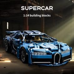 Supercar toy model built from LEGO bricks in a dim industrial setting with sunlight streaming in, showcasing detailed craftsmanship and vibrant blue color for automotive enthusiasts and LEGO fans.
