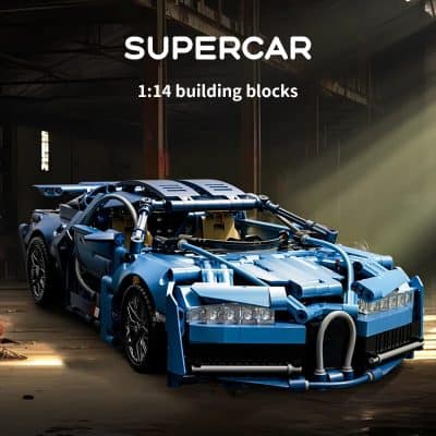 Supercar toy model built from LEGO bricks in a dim industrial setting with sunlight streaming in, showcasing detailed craftsmanship and vibrant blue color for automotive enthusiasts and LEGO fans.